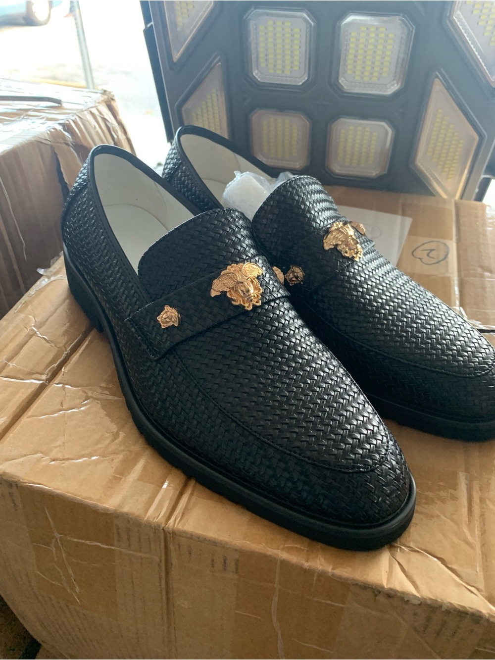 Versace Black Woven Leather Loafers with Gold Medusa Accents for Men
